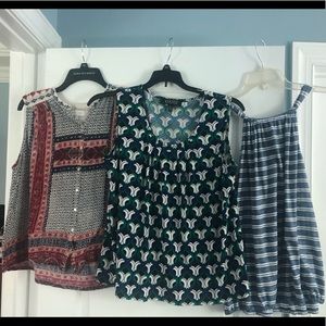 A beautiful lot of three size L sleeveless tops